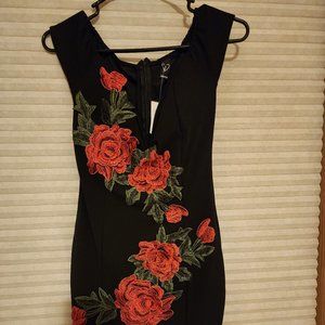 Black dress with beautiful red rose accents